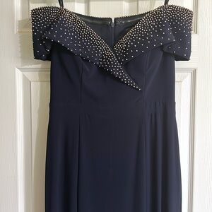 Strapless evening gown with gold tone accents